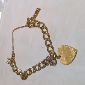 Monet gold toned heart charm bracelet